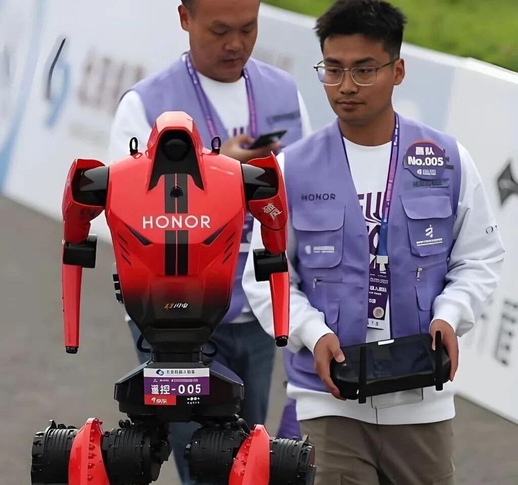 Team members are helping the robot run
